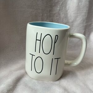 Rae Dunn Hop To It Easter Holiday Coffee Mug. NWT. White with Blue Interior.